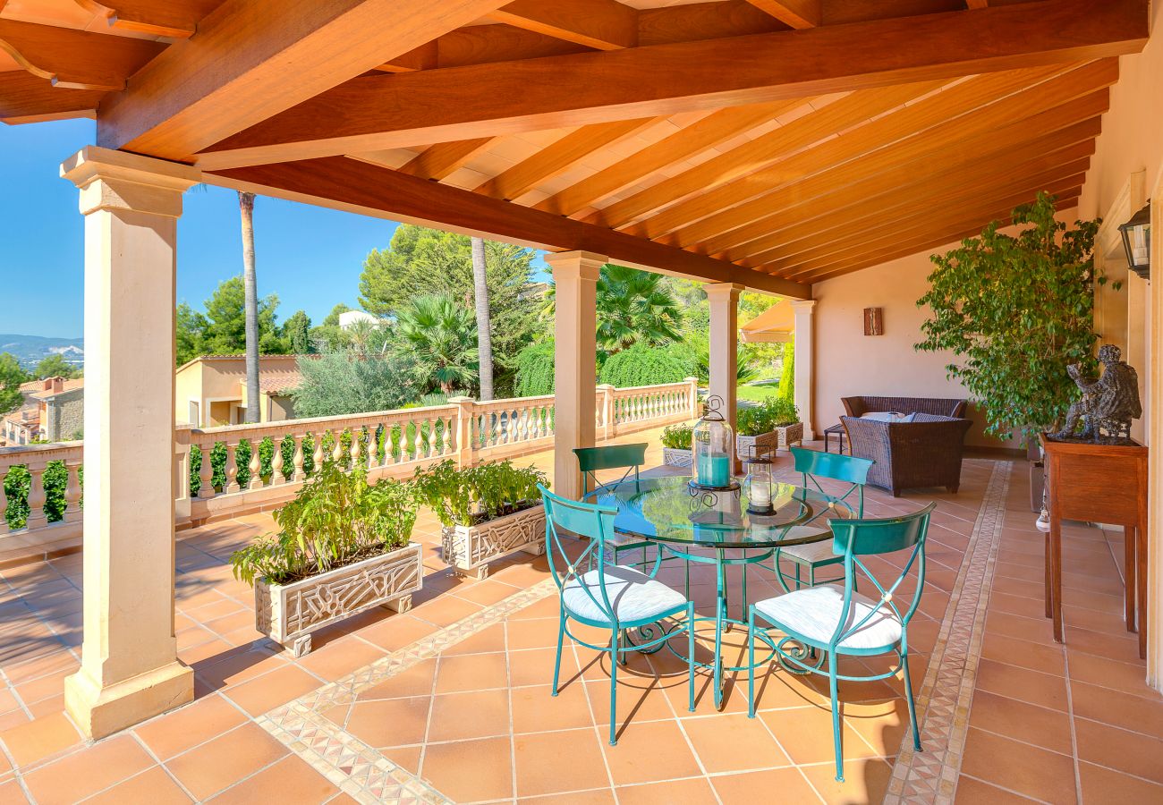 Covered outdoor dining area with views.