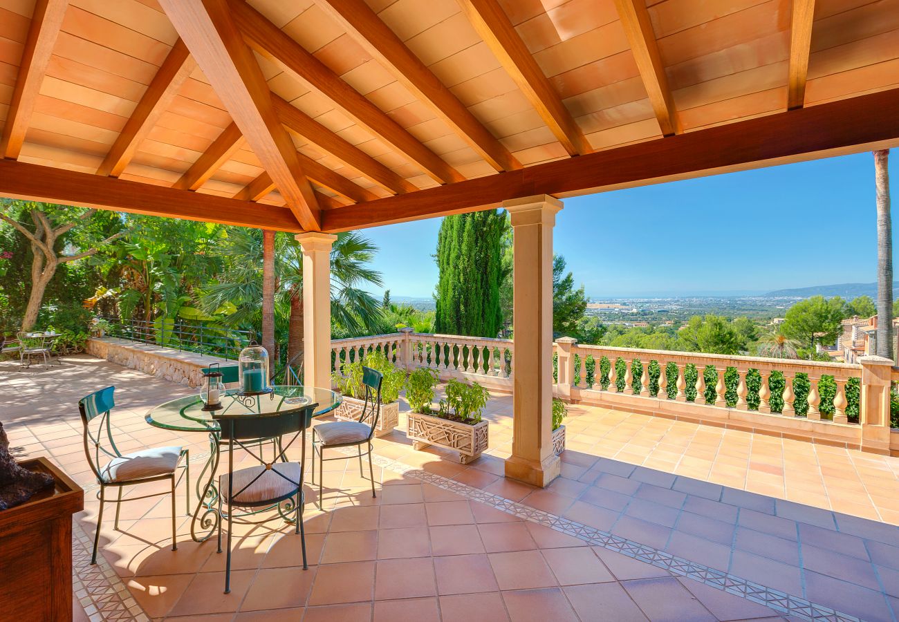 Covered outdoor dining area with views.