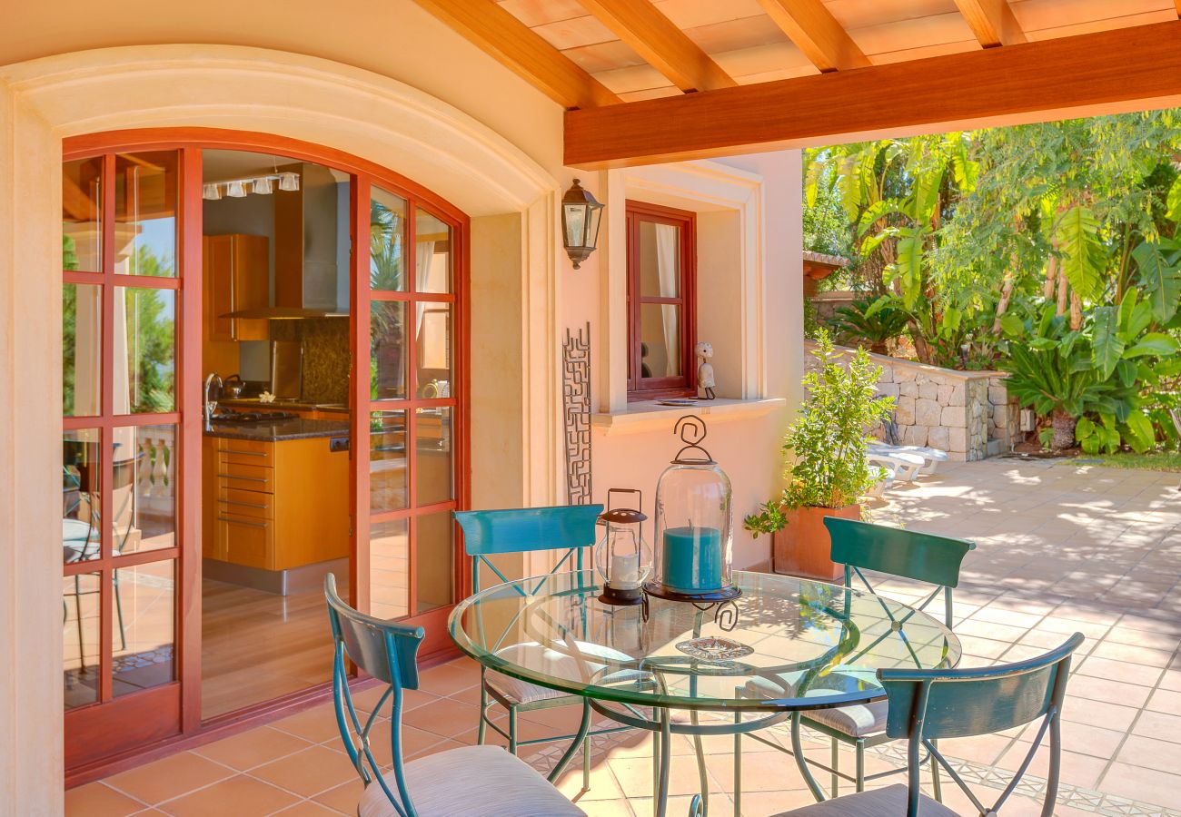 Covered outdoor dining area with views.