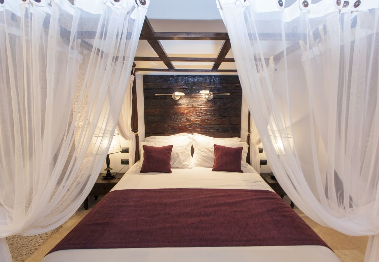 Bedroom canopy bed luxurious Villa Ibiza