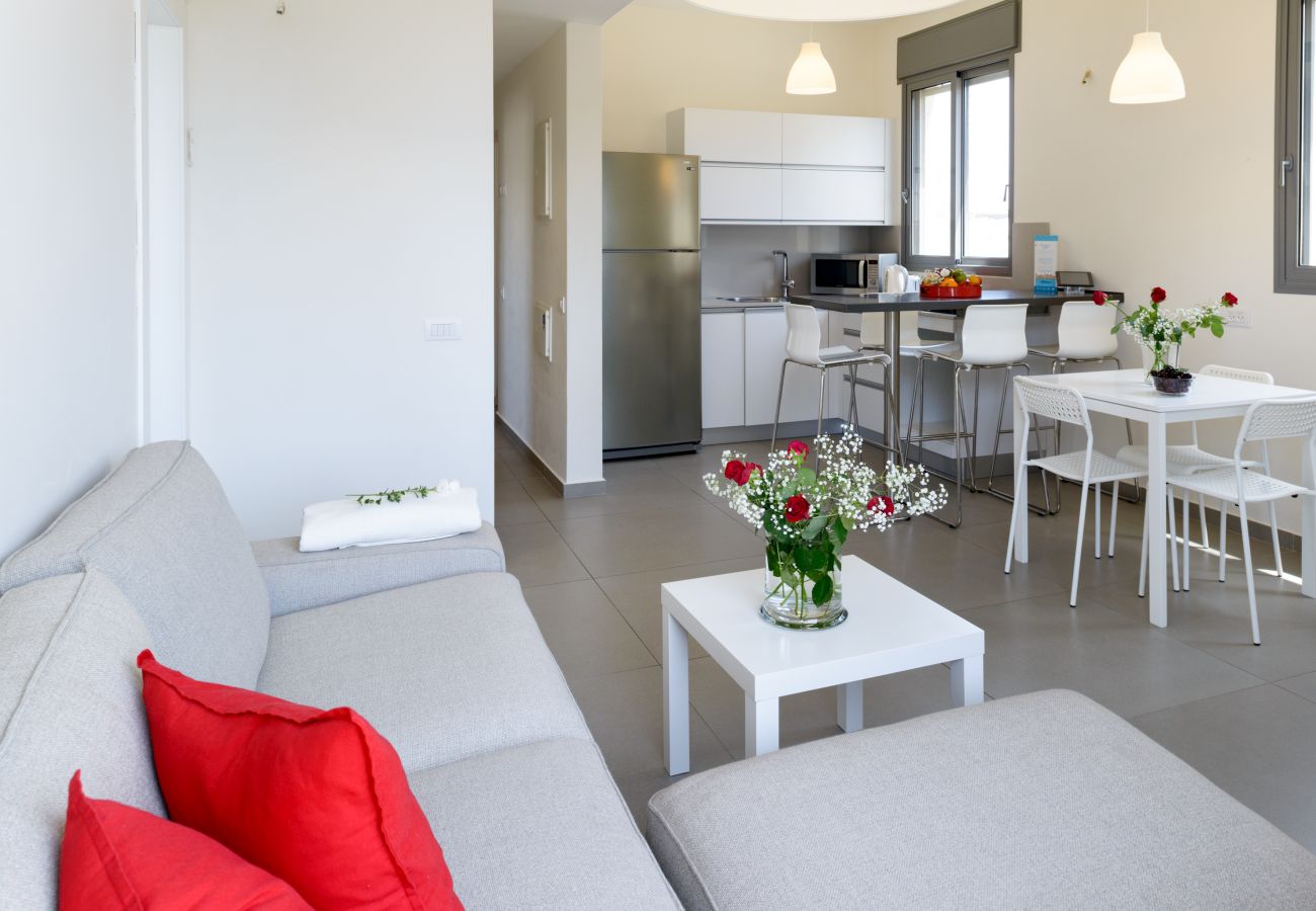 Modern living room with a kitchen view on Ben Yehuda st.