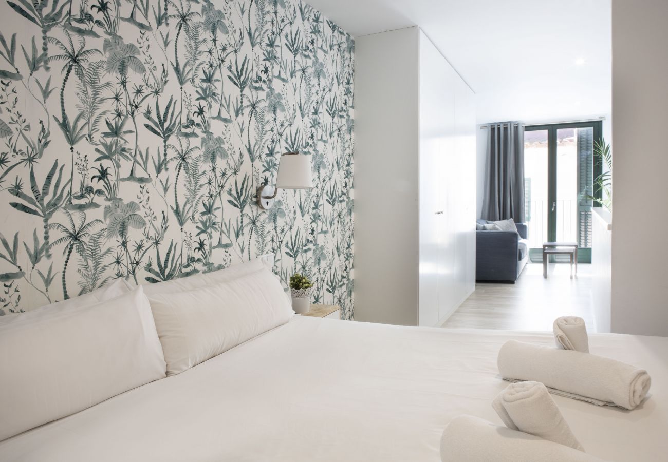 Bedroom and sofa bed in Sitges holiday apartment