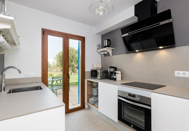 Villa in Maria de la salut - YourHouse Carrera Plana, family-friendly country house with pool and garden Villa in Maria de la salut - YourHouse Carrera Plana, family-friendly country house with pool and garden