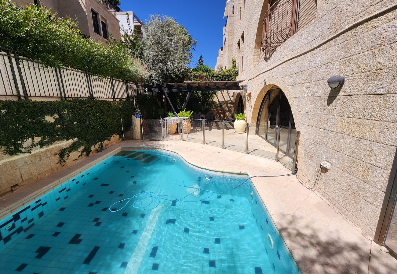 Apartment in Jerusalem - David's Village with Pool & Patio for Families by FeelHome