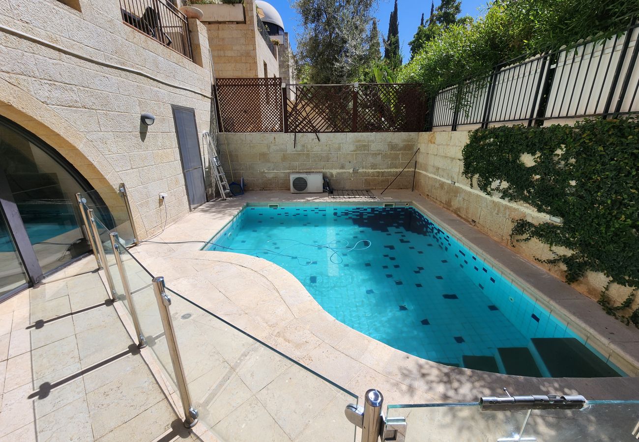 Apartment in Jerusalem - David's Village with Pool & Patio for Families by FeelHome