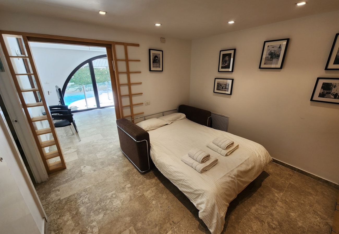 Apartment in Jerusalem - David's Village with Pool & Patio for Families by FeelHome