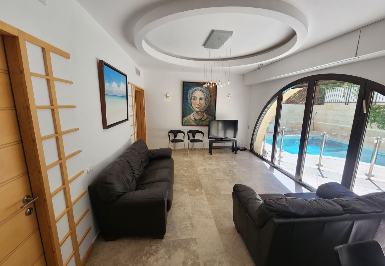 Apartment in Jerusalem - David's Village with Pool & Patio for Families by FeelHome